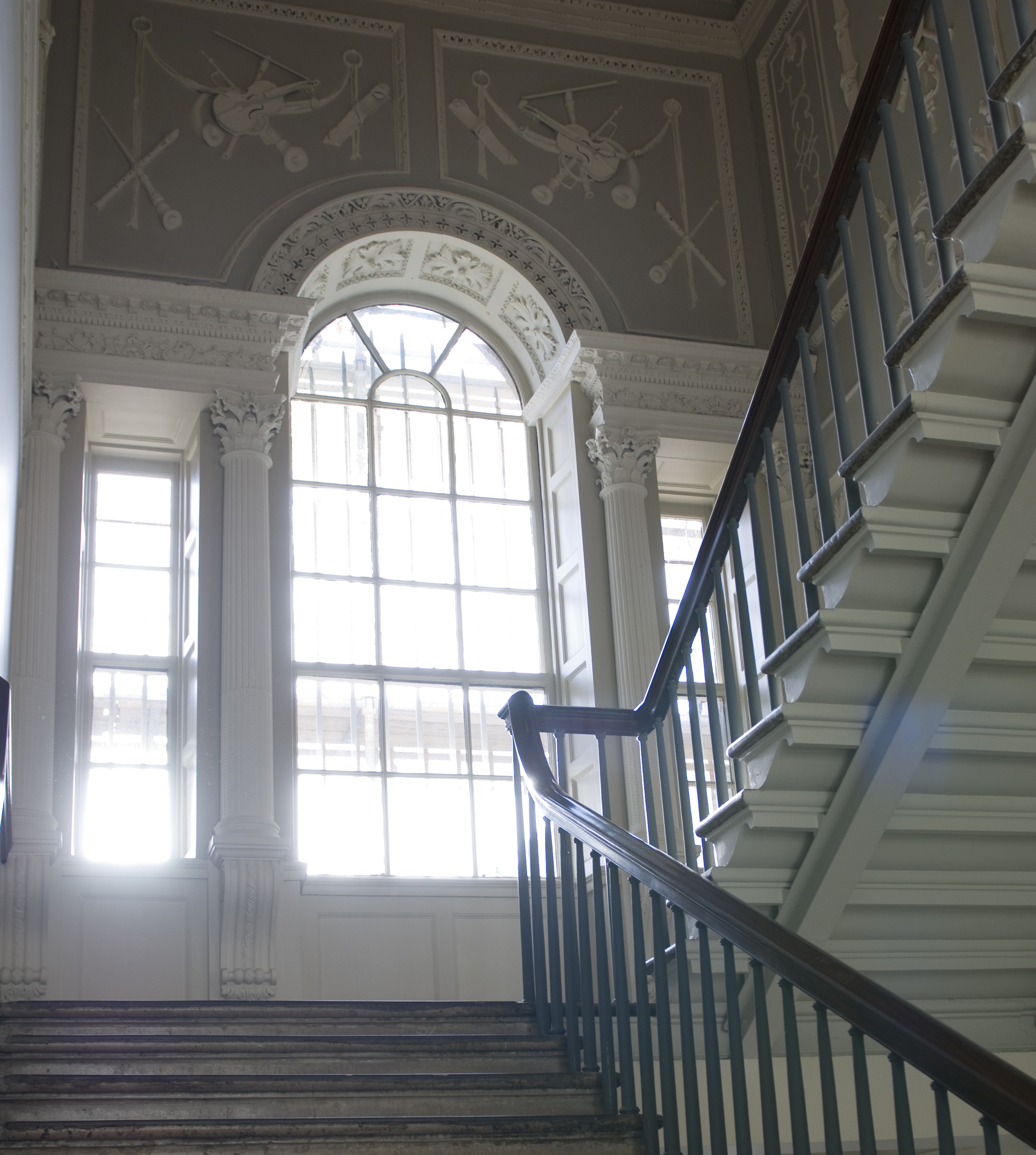 Mains stairs with feature window in Newman House