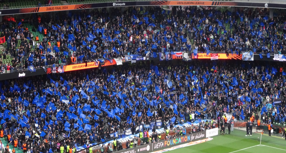 Football supporters in a crowded stadium
