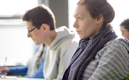 Two students in a lecture