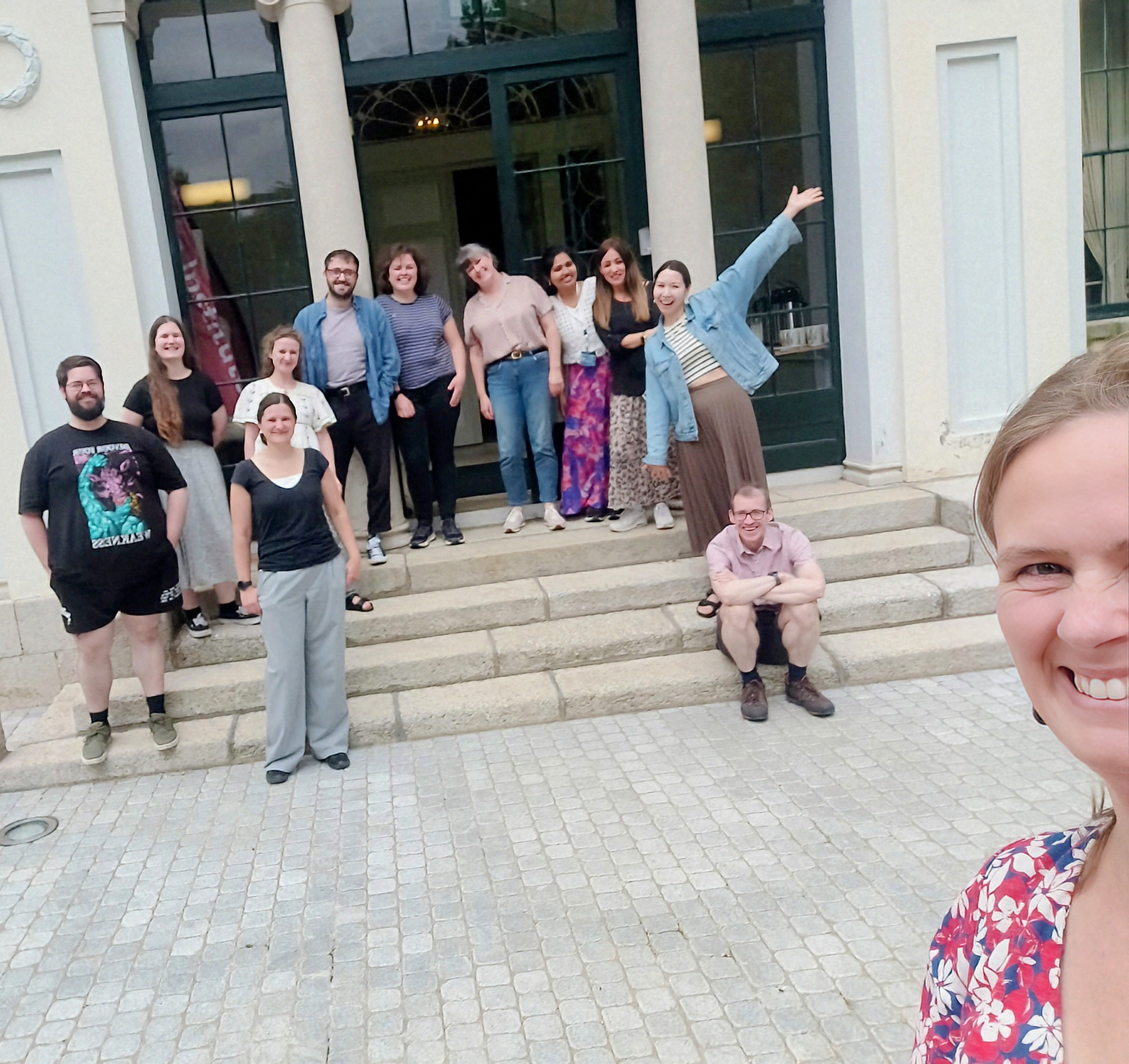Group photo outside Belfield House