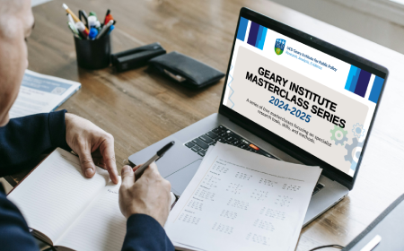 Computer with GIRSI poster