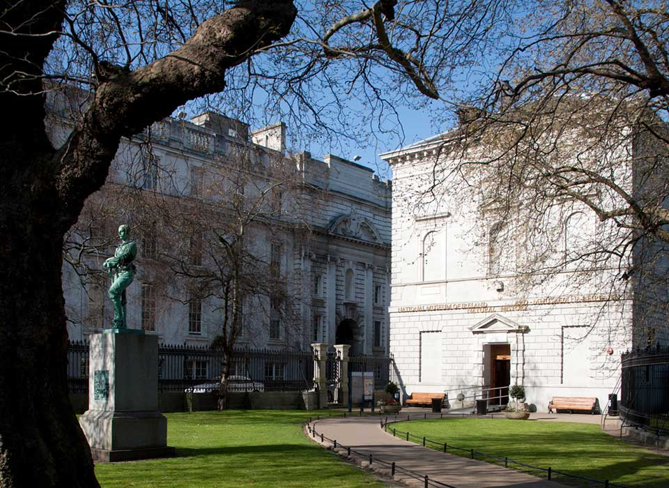 Exterior of Ireland's Natural History Museum with statue in the foreground