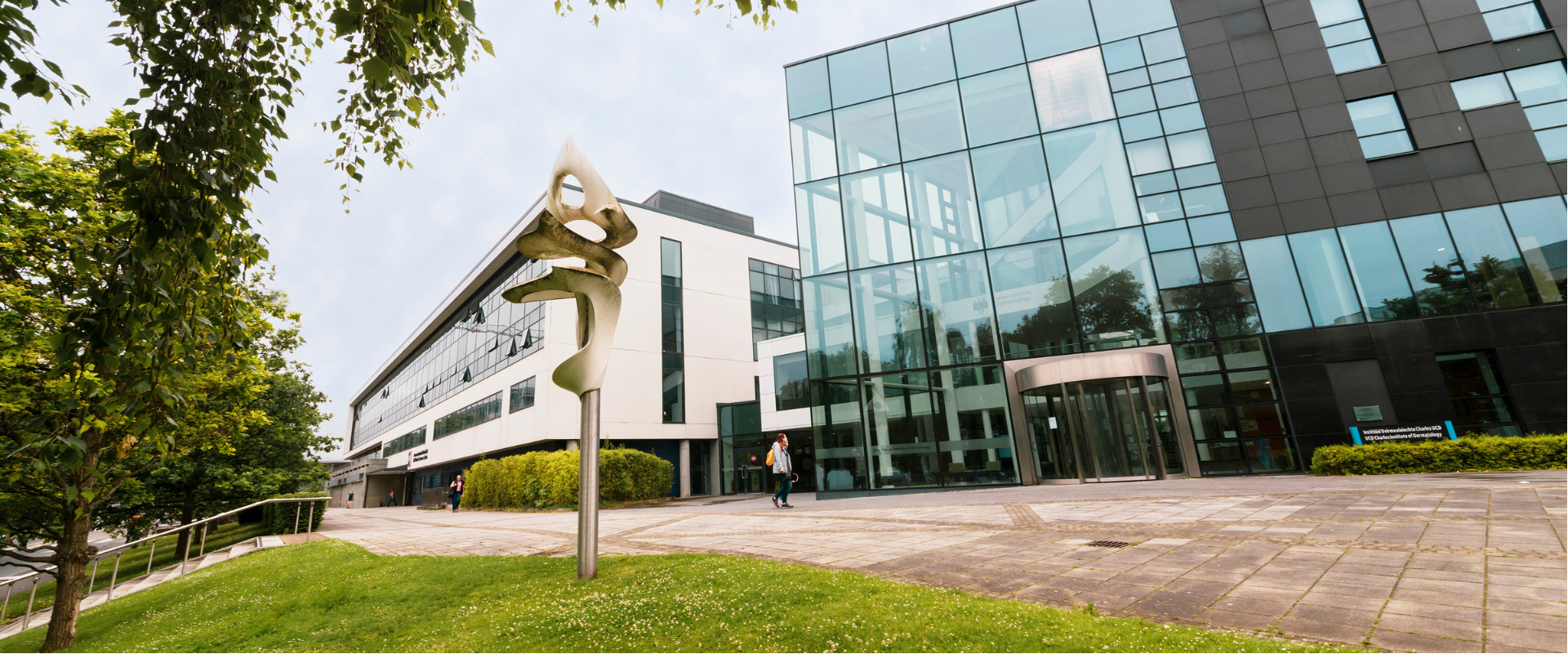 Health Sciences to the left and the Charles Institute to the right with sculpture at the centre