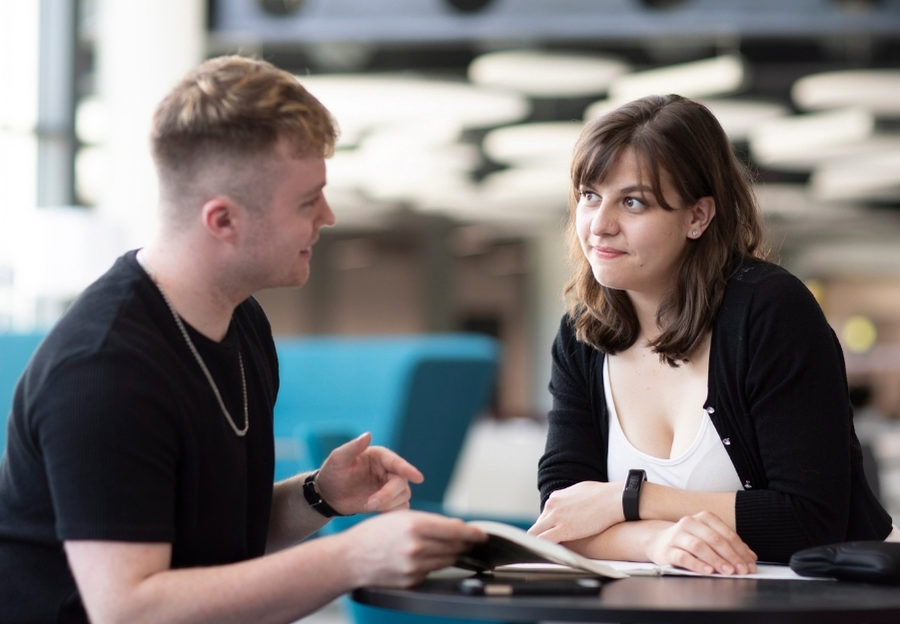 Students discussing applications