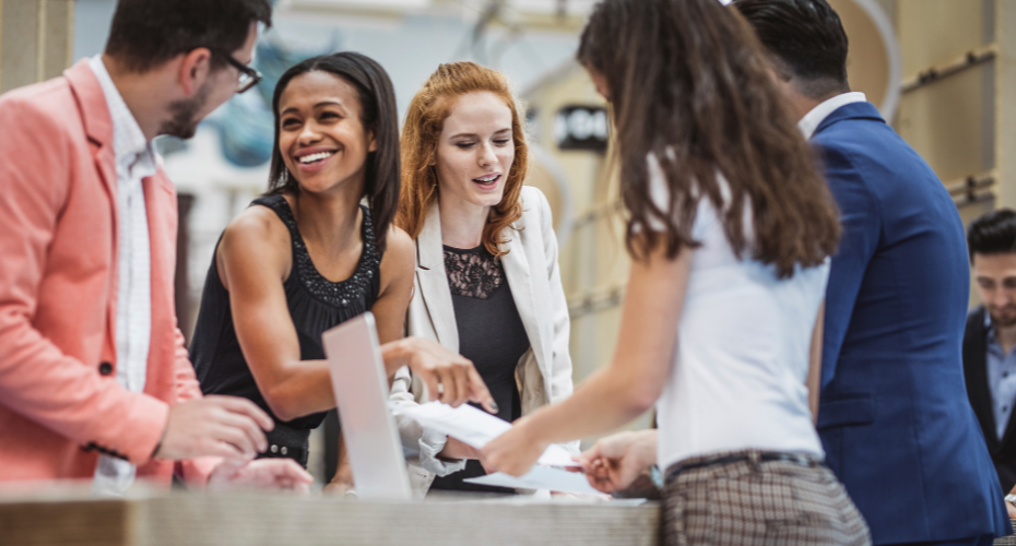 Young people working in a group in an office