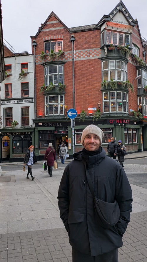 smiling man outside shop in Dublin
