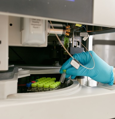 Placing tubes in machine